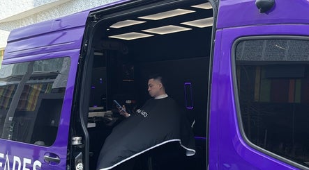 Client receiving haircut in Montana Fades Mobile Barbershop, Dubai, Dubai, AE, interior view.