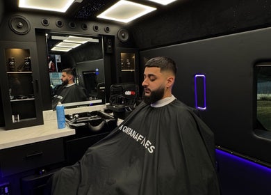 Client receiving a haircut at Montana Fades Mobile Barbershop, Dubai, Dubai, AE.