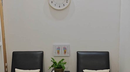Cozy seating area with soft pillows at HER3 DAY SPA MASSAGE & ACUPUNCTURE, Marrickville, New South Wales, AU.