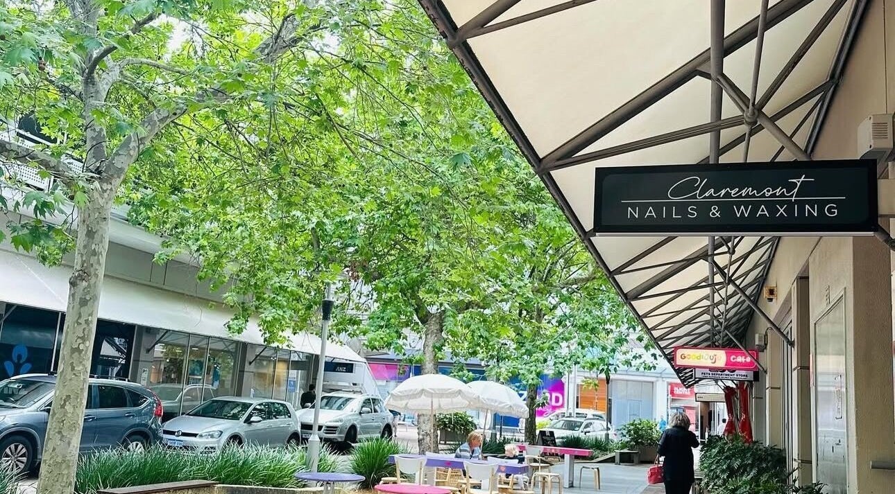 Charming street view of Claremont Nails & Waxing in Claremont, Western Australia, AU, surrounded by greenery.
