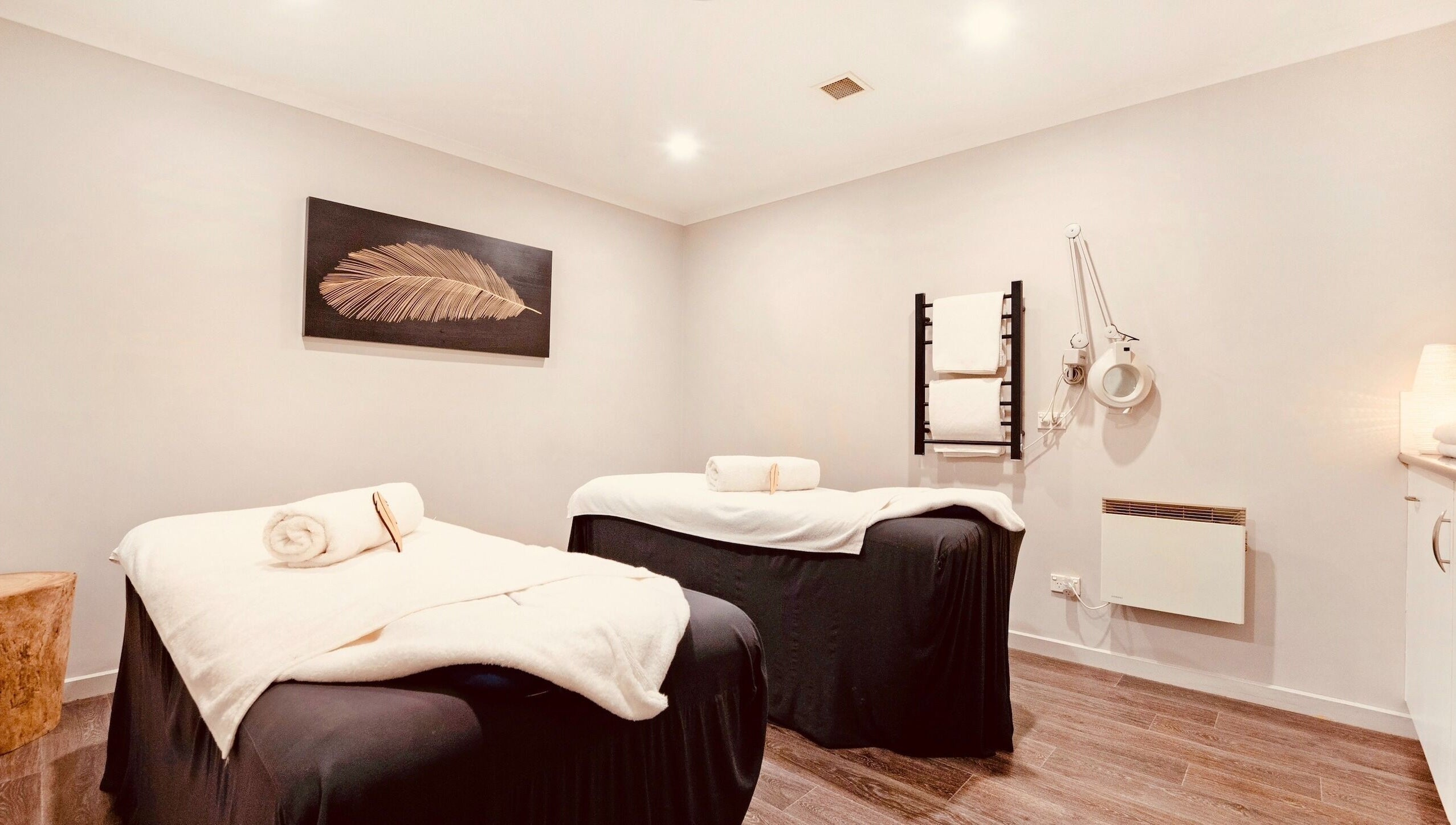 Tranquil treatment room at Port Fairy Day Spa in Port Fairy, Victoria, AU, featuring two massage tables.