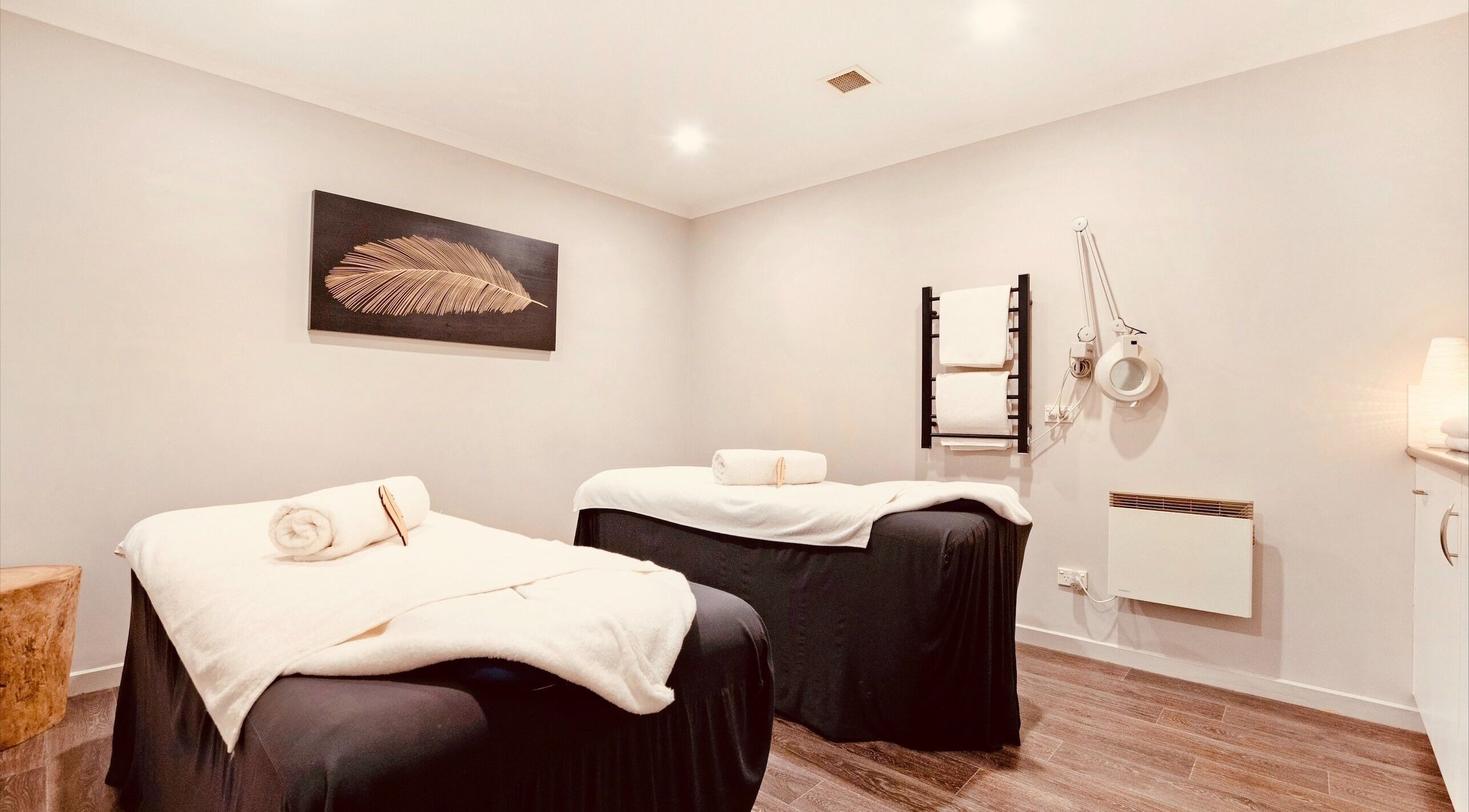 Tranquil treatment room at Port Fairy Day Spa in Port Fairy, Victoria, AU, featuring two massage tables.