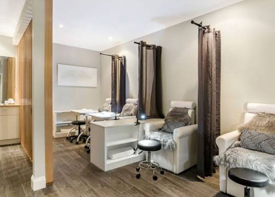 Relaxing spa lounge at Port Fairy Day Spa, Port Fairy, Victoria, AU with plush seating and wooden floor.