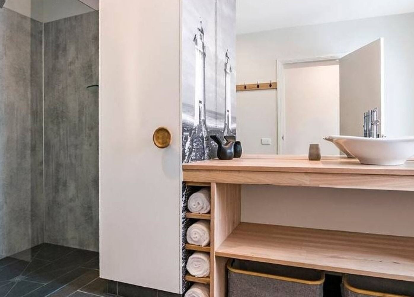 Luxurious spa room at Port Fairy Day Spa in Port Fairy, Victoria, AU featuring modern shower and elegant decor.