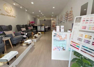 Interior of Luna Nails & Beauty in Southport, Queensland, AU showcasing stylish nail spa seating and polish options.