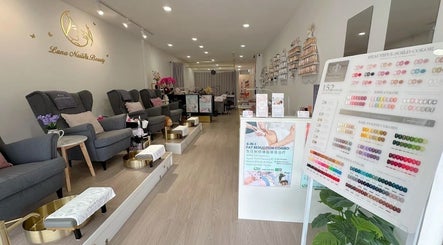 Interior of Luna Nails & Beauty in Southport, Queensland, AU showcasing stylish nail spa seating and polish options.