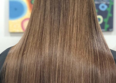 Glossy straight hair styled at Hairbylianne, Leeds, England, GB.
