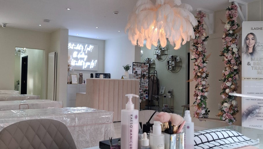 Elegant LKBeauty interior with floral decor in Preston, England, GB, highlighting modern wellness amenities.