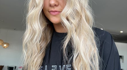 Gorgeous wavy blonde hair styled at Aloha Hair & co, Varsity Lakes, Queensland, AU.
