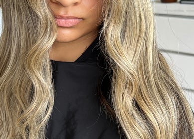 Styled blonde hair waves at Aloha Hair & co, Varsity Lakes, Queensland, AU, showcasing salon expertise.