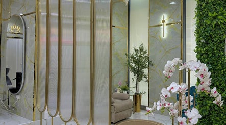 Luxurious interior of Adelya Al Medina Beauty Salon in Dubai, AE with elegant decor and lush greenery.