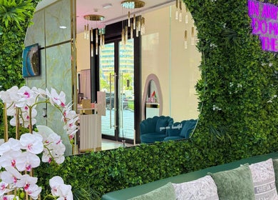 Lush greenery and decor at Adelya Al Medina Beauty Salon, Dubai, AE, offering a serene and elegant atmosphere.
