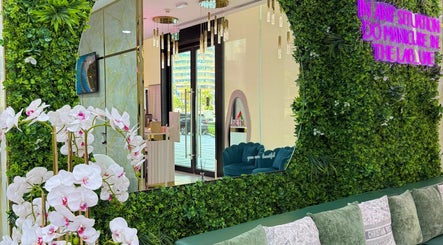 Lush greenery and decor at Adelya Al Medina Beauty Salon, Dubai, AE, offering a serene and elegant atmosphere.