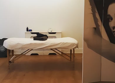 Relaxing massage room at The Peak Wellness Studio, Dublin, County Dublin, IE with cozy ambiance.