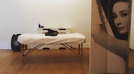Relaxing massage room at The Peak Wellness Studio, Dublin, County Dublin, IE with cozy ambiance.