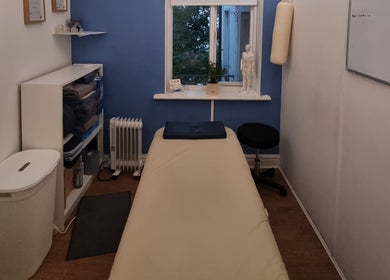 Relaxing treatment room at The Peak Wellness Studio, Dublin, County Dublin, IE, featuring a cozy massage table.
