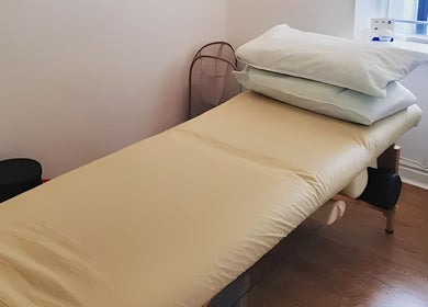 Massage table in a serene room at The Peak Wellness Studio, Dublin, County Dublin, IE.
