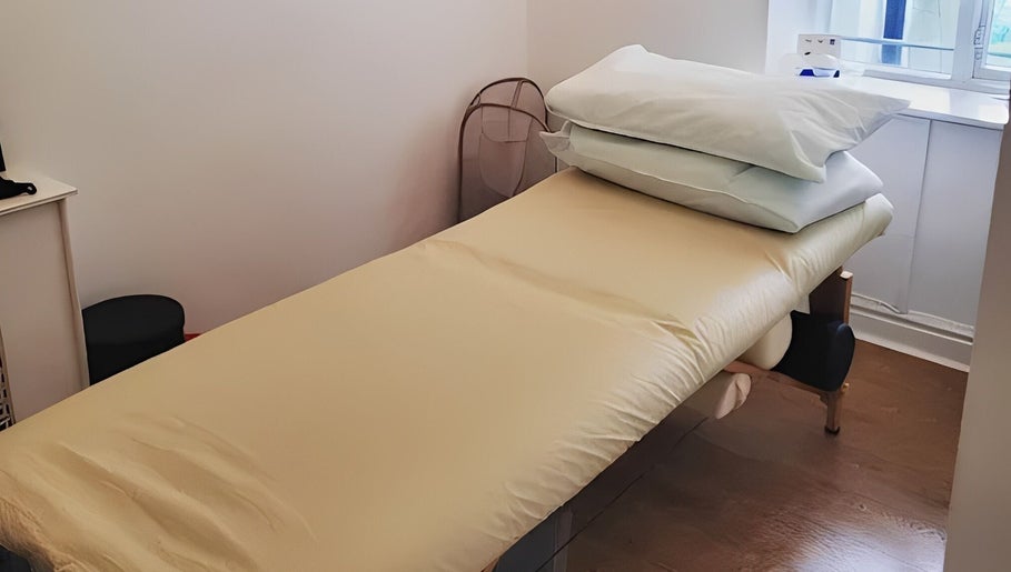 Massage table in The Peak Wellness Studio, Dublin, County Dublin, IE, offers a tranquil setting.