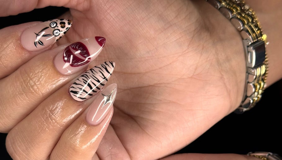 Artistic nail designs at Refined By Courtney Joyce, Hucclecote, England, GB, featuring intricate patterns.