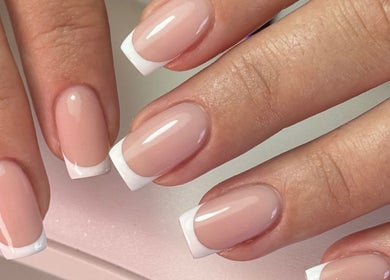 Elegant French manicure at Refined By Courtney Joyce, Hucclecote, England, GB, showcasing classic style.