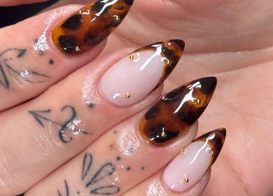Stylish tortoise shell nail design at Refined By Courtney Joyce, Hucclecote, England, GB.