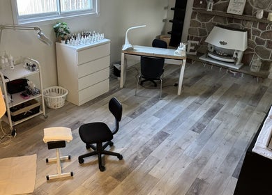 Modern nail studio at Elegance Esthetics in Simcoe, Ontario, CA, featuring stylish decor and professional setup.