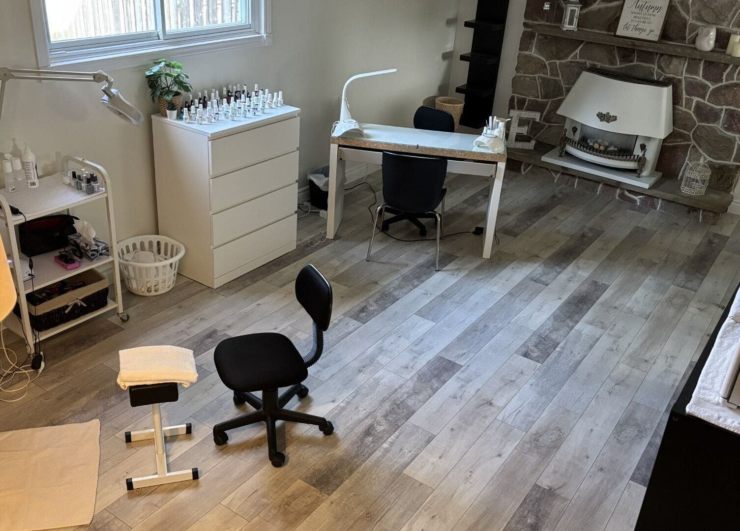 Modern nail studio at Elegance Esthetics in Simcoe, Ontario, CA, featuring stylish decor and professional setup.