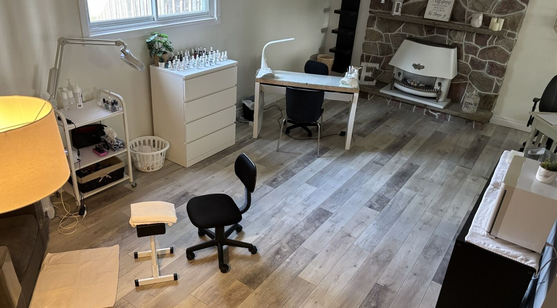 Modern nail studio at Elegance Esthetics in Simcoe, Ontario, CA, featuring stylish decor and professional setup.