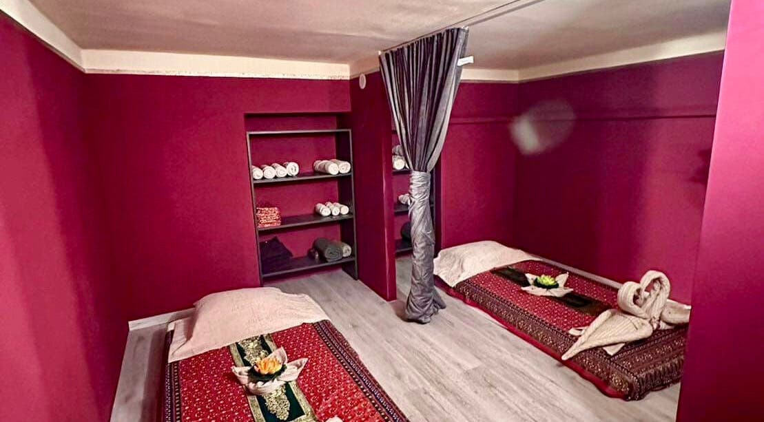 Relaxing massage room at Pavina Thai Massage - 1065 Budapest Lázár utca 12, Budapest, Magyar, HU with two beds.