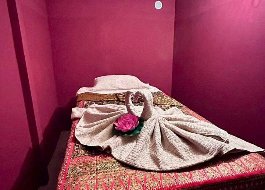 Serene massage room at Pavina Thai Massage - 1065 Budapest Lázár utca 12, Budapest, Magyar, HU. Elegant towel swan on bed.