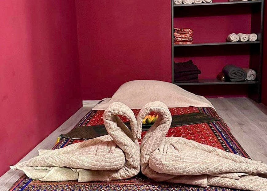 Relaxing massage room with towel swans at Pavina Thai Massage, Budapest, Magyar, HU.