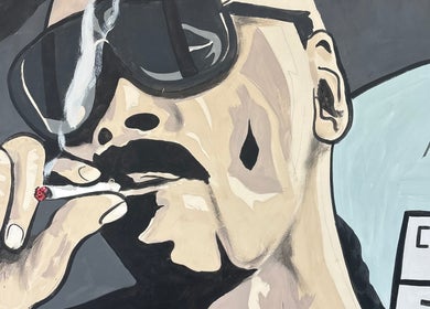 Graffiti mural of a man with sunglasses at Ussy’s barbers, Thornaby, England, GB.