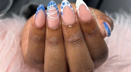 Elegant blue and white nail art at The Look Nails By Taria, Marsh Harbour, Central Abaco, BS.