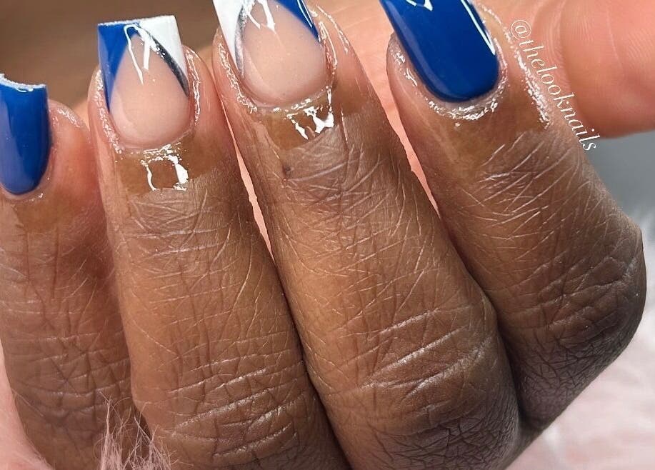 Elegant blue and white nail design at The Look Nails By Taria, Marsh Harbour, Central Abaco, BS.