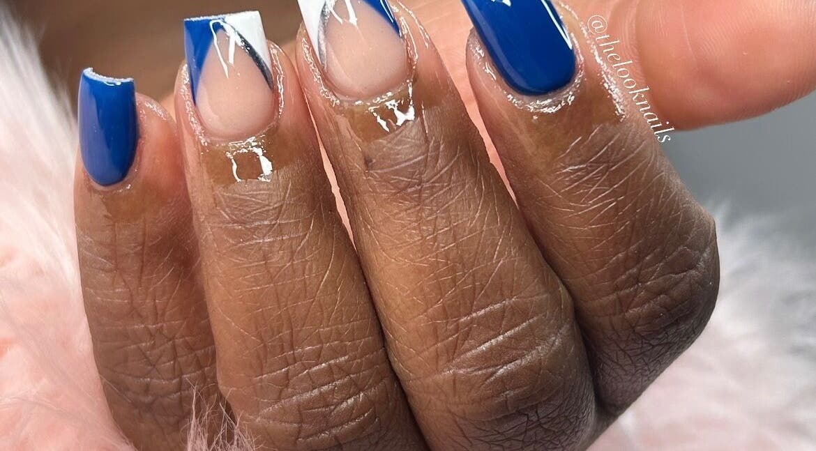 Elegant blue and white nail design at The Look Nails By Taria, Marsh Harbour, Central Abaco, BS.