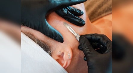 Expert dermaplaning at Athena Miami Head Spa, LLC, Miami, Florida, US, enhancing skin radiance.