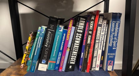 Books on sports therapy at A&M Physiotherapy, Kenilworth, England, GB
