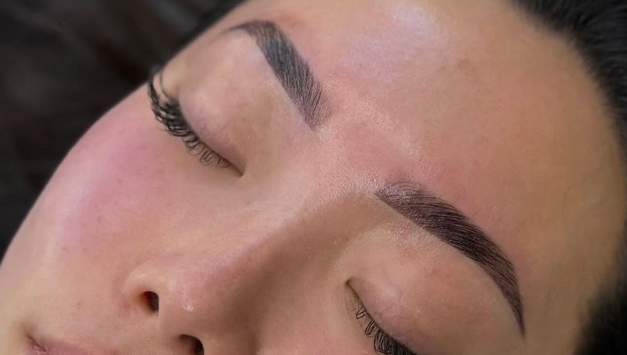 Close-up of expertly shaped eyebrows at Arch And Lash Co, Telford, England, GB.