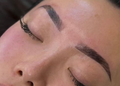 Close-up of expertly shaped eyebrows at Arch And Lash Co, Telford, England, GB.