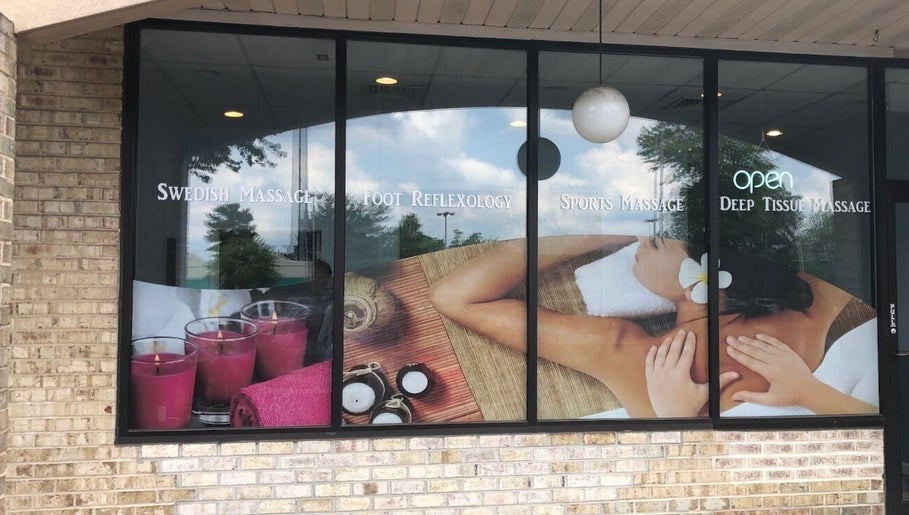 Entrance to Massage Randolph in Colesville, Maryland showcasing spa services with relaxing imagery.