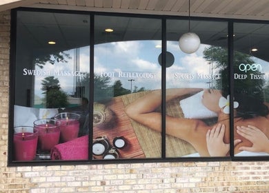 Entrance to Massage Randolph in Colesville, Maryland showcasing spa services with relaxing imagery.