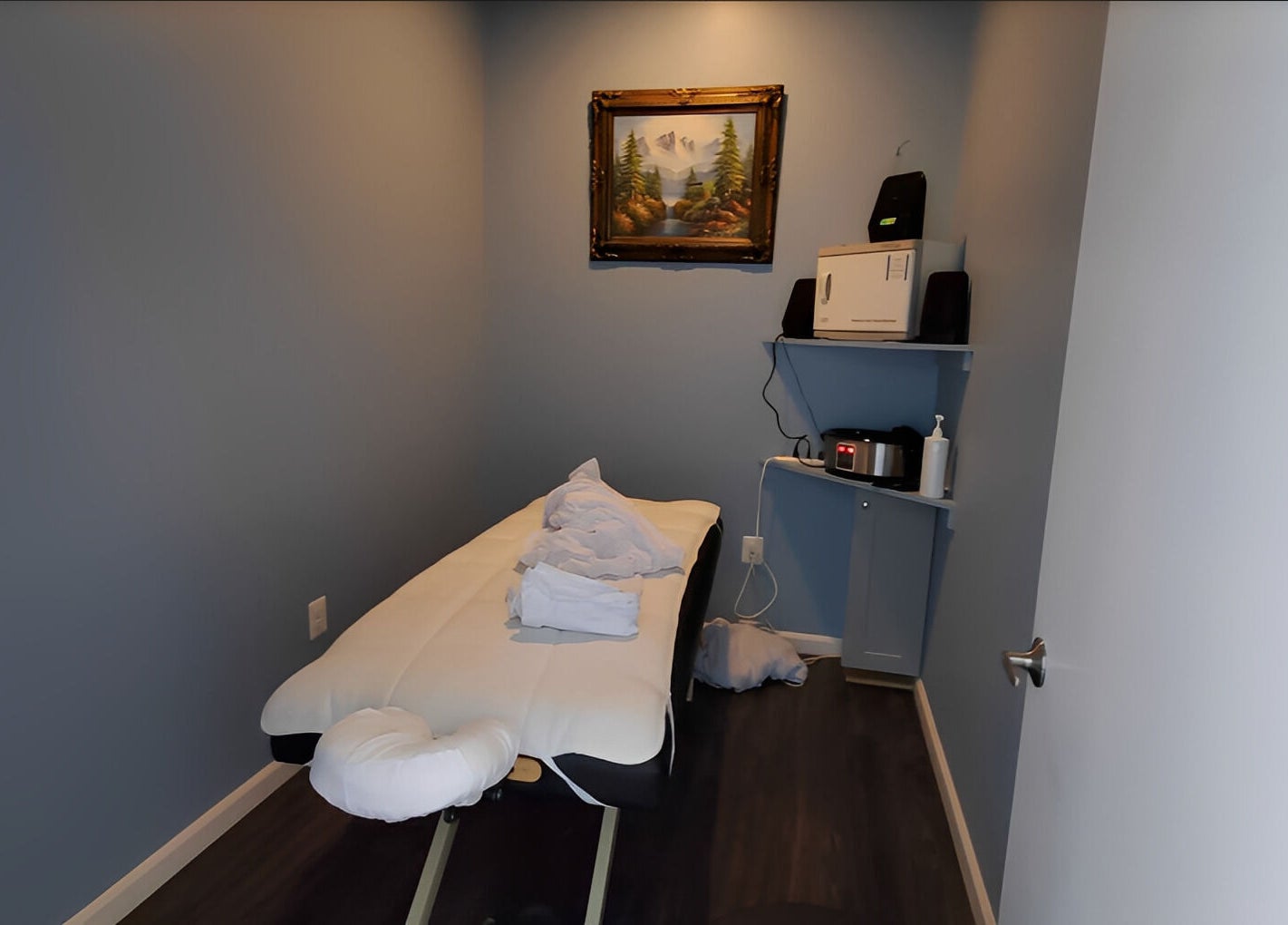 Tranquil massage room at Massage Randolph in Colesville, Maryland, US with a massage table and soothing decor.