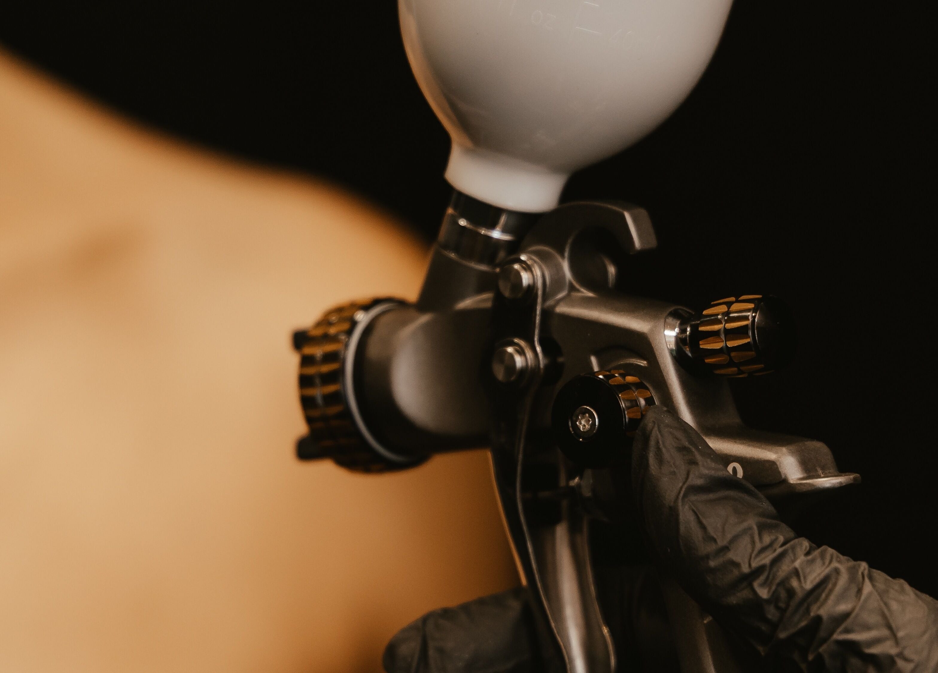 Professional spray tan equipment in action at COVE - Spray Tan Studio, Hethersett, England, GB.