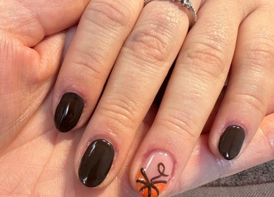 Elegant autumn-themed nail design at Radiant by Rosie, Bradford, England, GB. Perfect for seasonal style.