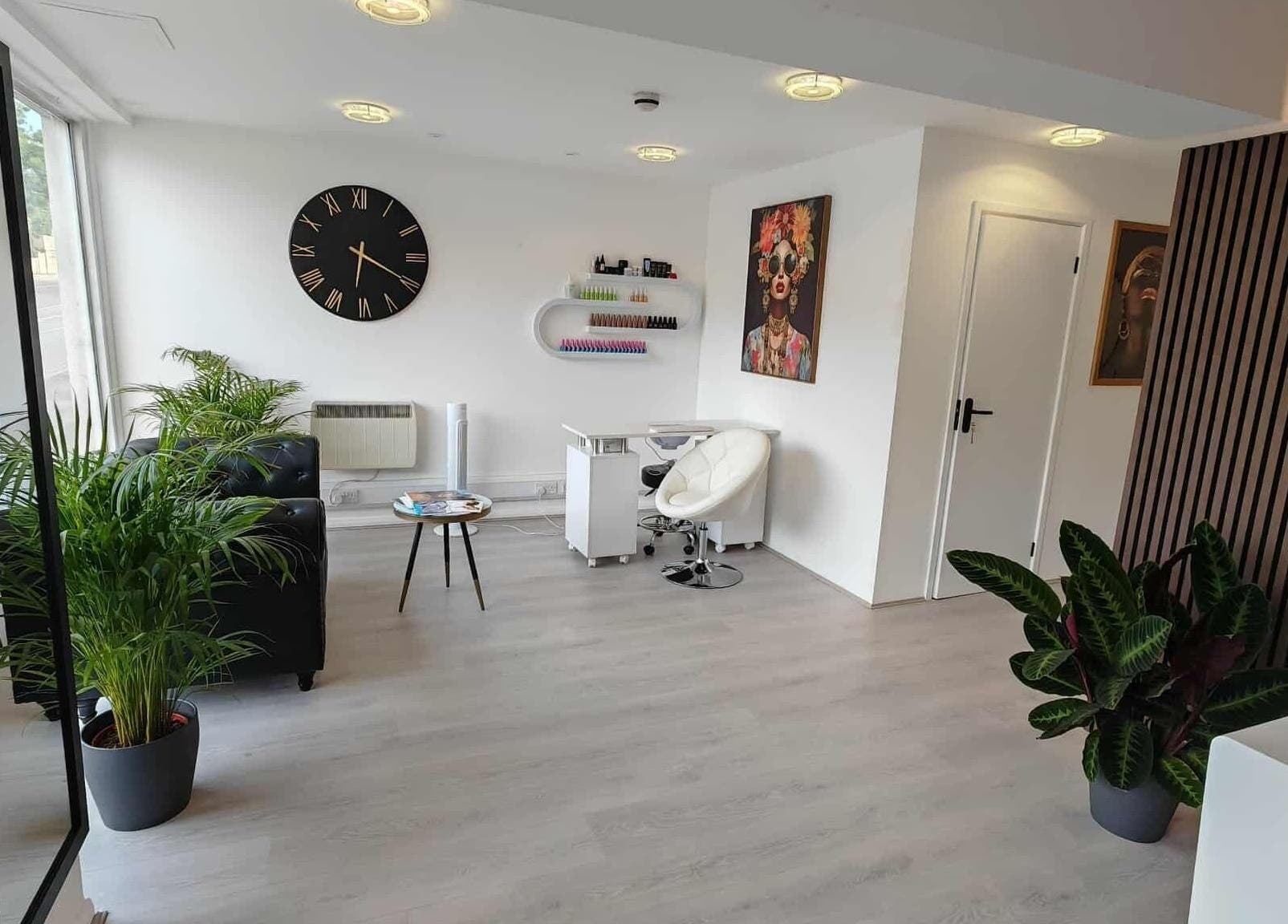 Elegant interior of VIO AESTHETICS CLINIC in Reading, England, GB with chic decor and greenery.