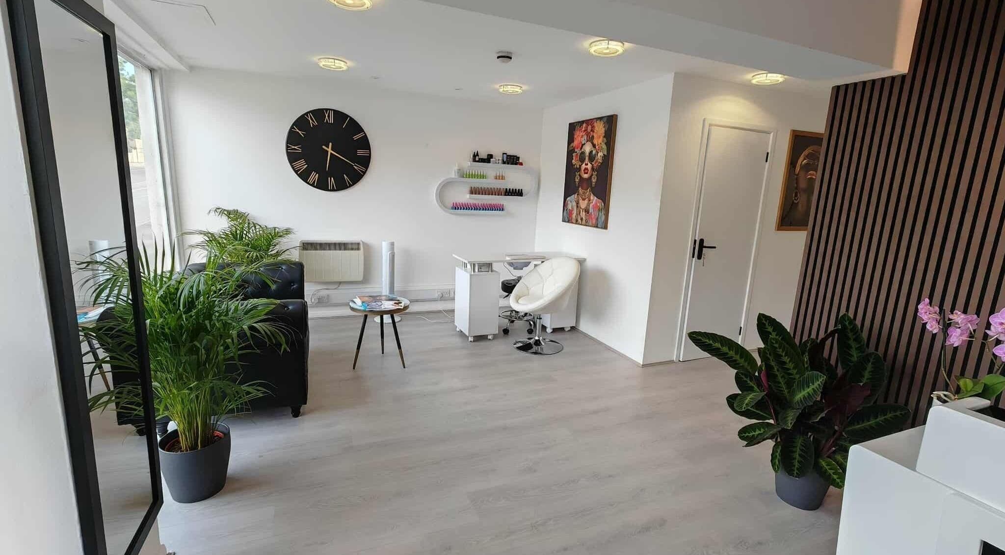 Elegant interior of VIO AESTHETICS CLINIC in Reading, England, GB with chic decor and greenery.