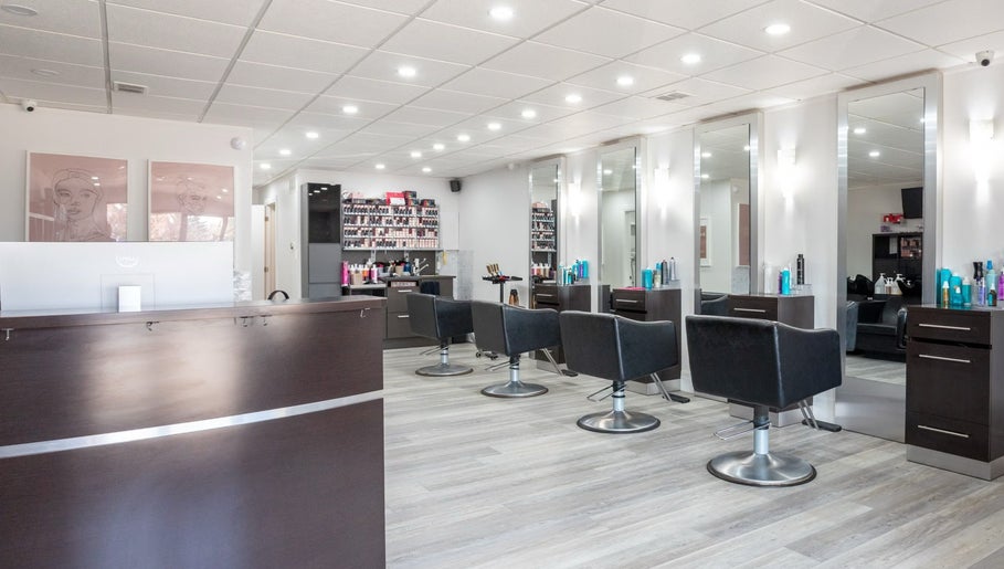 Stylish seating and modern design at Waxman salon in Mississauga, Ontario, CA, showcasing elegance and comfort.