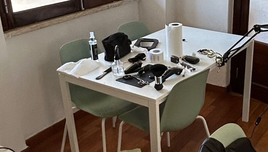 JSbarber tools on a table in Rio De Mouro, Lisboa, PT, showcasing professional barber equipment.