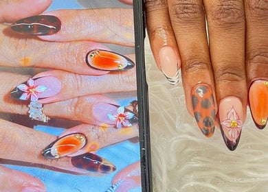 Elegant floral nail art at Tjizaa Beauty Haven, Windhoek, Khomas Region, NA showcasing creativity and style.