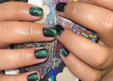 Intricate emerald nail art at J’AdoreClou, Abram, England, GB. Perfect for a stylish and chic look.